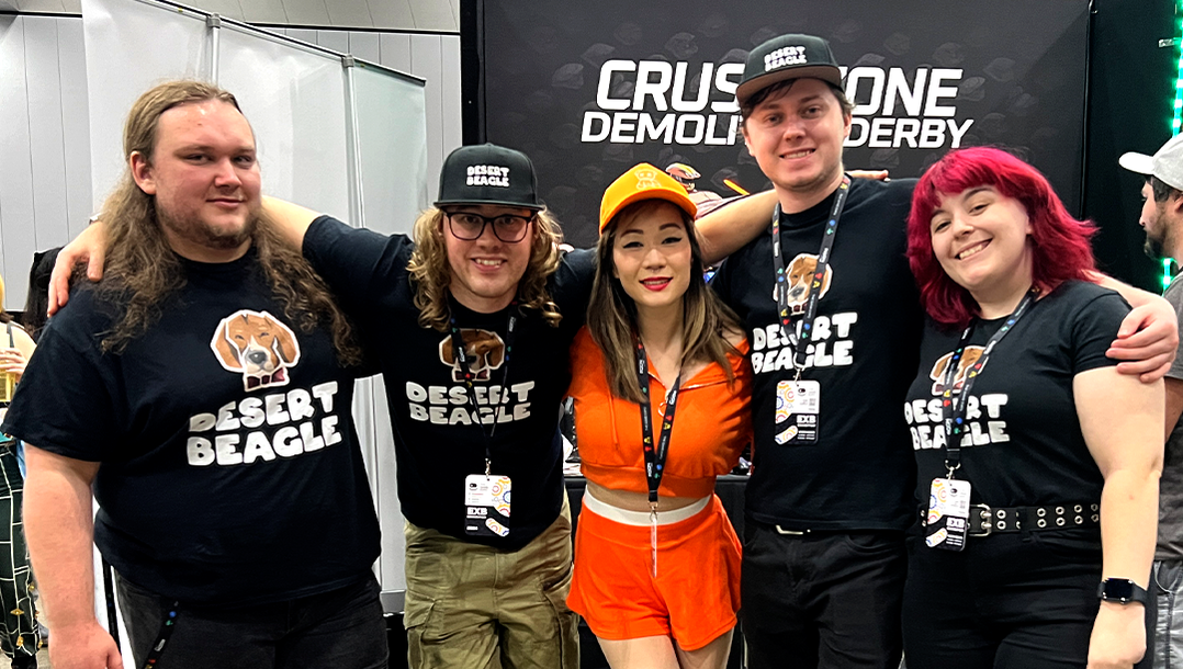 The Desert Beagle Team standing with Miyan Naoko Cosplayer at The Game Expo TGX