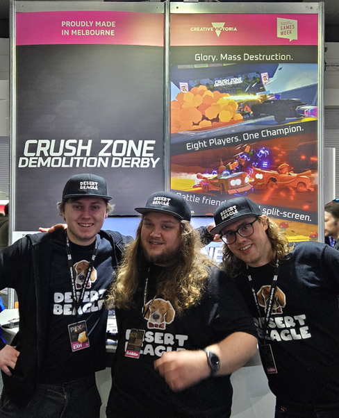The Desert Beagle team standing in front of their booth at PAX Australia 2023